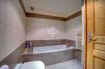Discover a serene bathroom retreat.