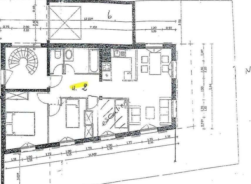 This property features a well-designed floor plan with a spiral staircase and multiple rooms.