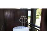 Discover the charm of this property, featuring a unique wooden design.
