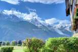 Experience breathtaking mountain views from this stunning property.