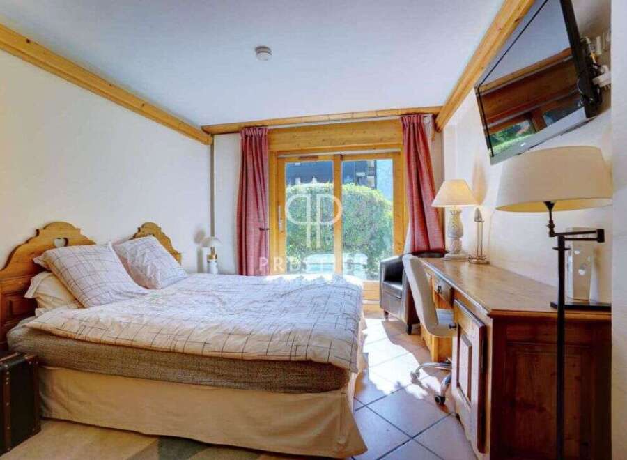 Discover a cozy bedroom retreat with a touch of rustic charm.