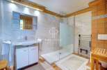Discover a luxurious bathroom with a modern shower and elegant vanity.