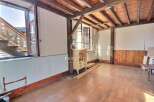 Discover the charm of this unique property, featuring exposed wooden beams and a warm, inviting atmosphere.
