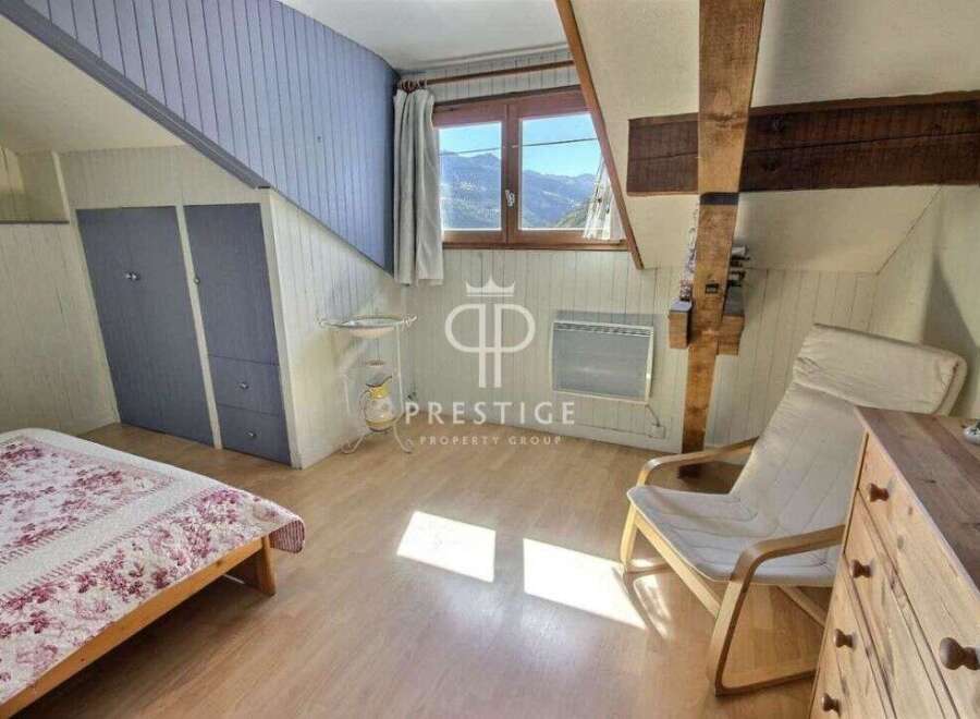 Charming attic bedroom with a cozy atmosphere.