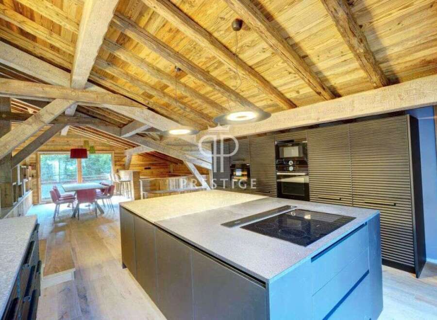 Discover the charm of this stunning property, featuring a beautifully designed kitchen with modern appliances and a spacious island.