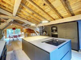 Discover the charm of this stunning property, featuring a beautifully designed kitchen with modern appliances and a spacious island.