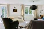 Discover a bright and airy living space, perfect for relaxation and entertaining.