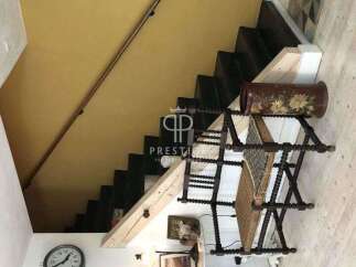 Discover the charm of this property with its unique staircase design.