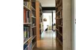Explore this stunning property featuring a unique library hallway.