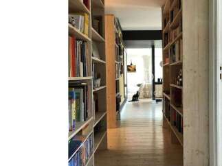 Explore this stunning property featuring a unique library hallway.