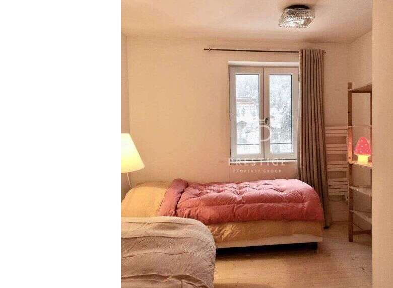 Discover a cozy bedroom with a warm and inviting atmosphere.