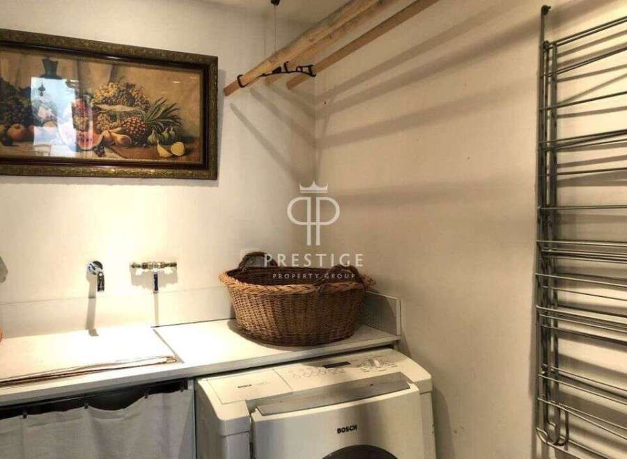 Discover a stylish laundry room with a modern design.