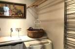 Discover a stylish laundry room with a modern design.