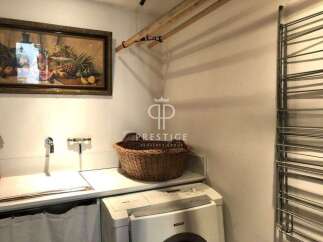 Discover a stylish laundry room with a modern design.
