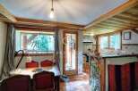 Discover the charm of this rustic property, featuring exposed wooden beams and a cozy atmosphere.