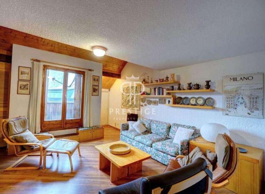 Discover a cozy living space with a charming wooden interior.