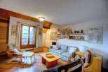 Discover a cozy living space with a charming wooden interior.