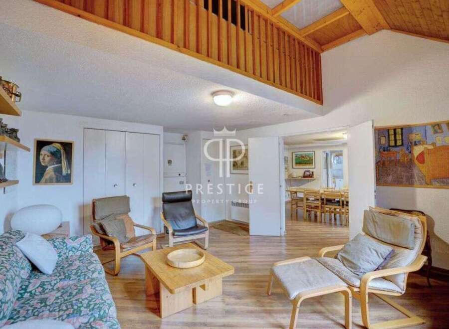 Discover a charming property with a unique loft area, perfect for creating a cozy living space.