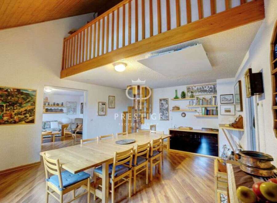 Discover the charm of this stunning property, featuring a unique mezzanine level and a spacious dining area perfect for gatherings.