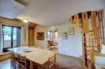 Discover a unique property featuring a stunning wooden spiral staircase, adding a touch of architectural elegance.