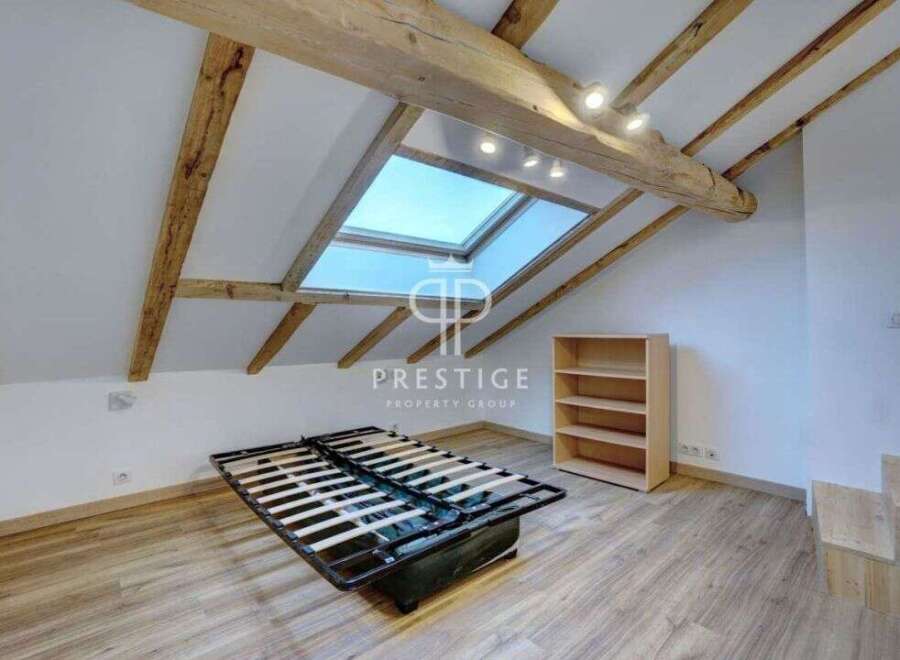 Discover this charming property featuring a unique architectural design.