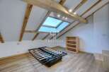 Discover this charming property featuring a unique architectural design.