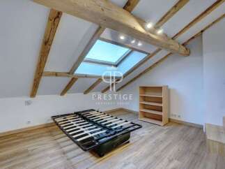 Discover this charming property featuring a unique architectural design.