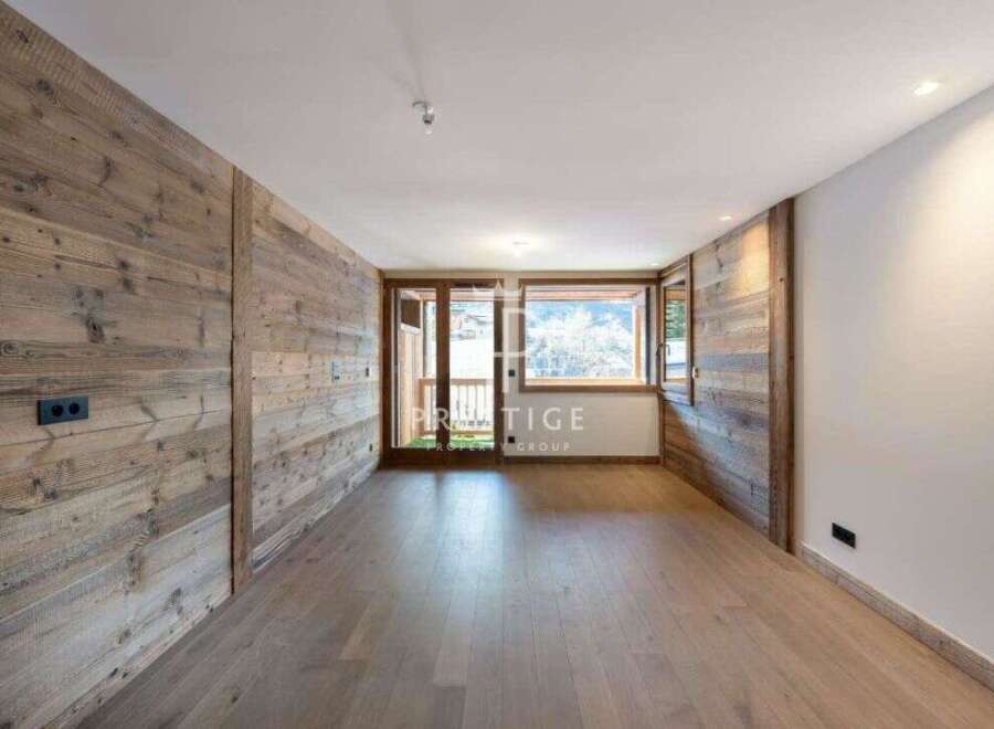 Discover the charm of this stunning property, featuring exquisite wooden paneling that adds warmth and character.