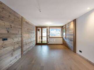 Discover the charm of this stunning property, featuring exquisite wooden paneling that adds warmth and character.