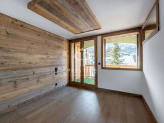 Discover the charm of this stunning property, featuring exquisite wooden accents throughout.