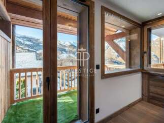 Experience breathtaking mountain views from this stunning property.