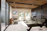 This stunning property boasts a state-of-the-art home gym, perfect for maintaining your fitness routine.