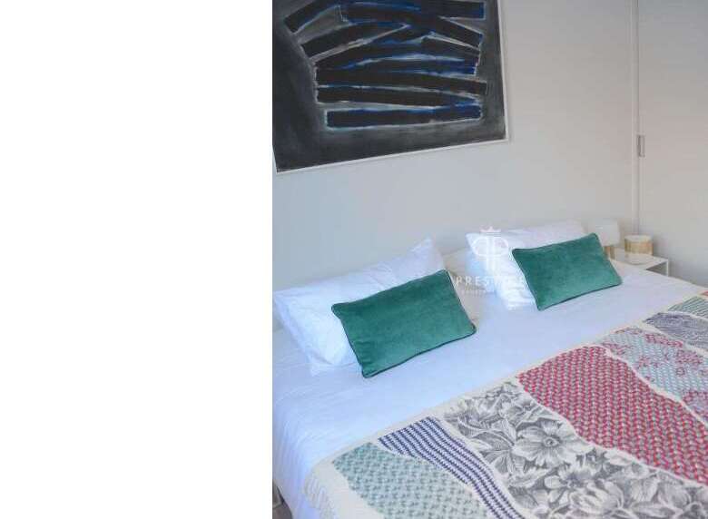 Discover the epitome of comfort in this stylish bedroom.