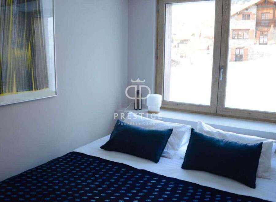 Discover a cozy bedroom with a stunning view.