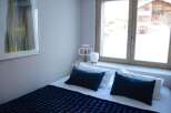 Discover a cozy bedroom with a stunning view.