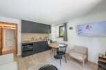 Discover this stylish property featuring a modern kitchen with sleek cabinetry and appliances.