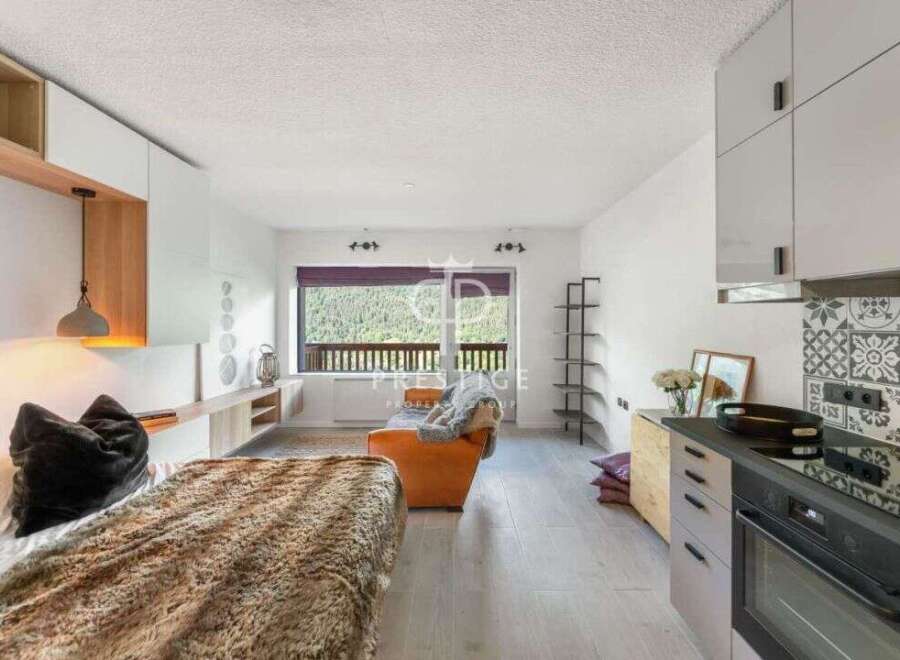 Discover a cozy retreat in this stylish apartment, perfect for a relaxing getaway.