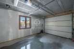 Discover this property's spacious garage, perfect for parking and storage.