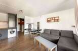 Discover this charming property featuring a well-equipped kitchen with a refrigerator and washing machine.