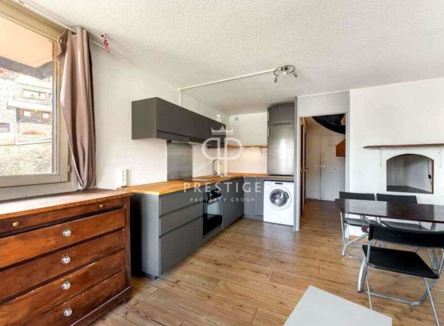 Discover this charming property featuring a modern kitchen with sleek cabinetry and appliances.