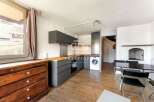 Discover this charming property featuring a modern kitchen with sleek cabinetry and appliances.