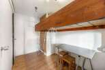 Discover this charming property featuring a unique loft bed, perfect for maximizing space.