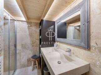 Discover a luxurious bathroom with a rustic charm.