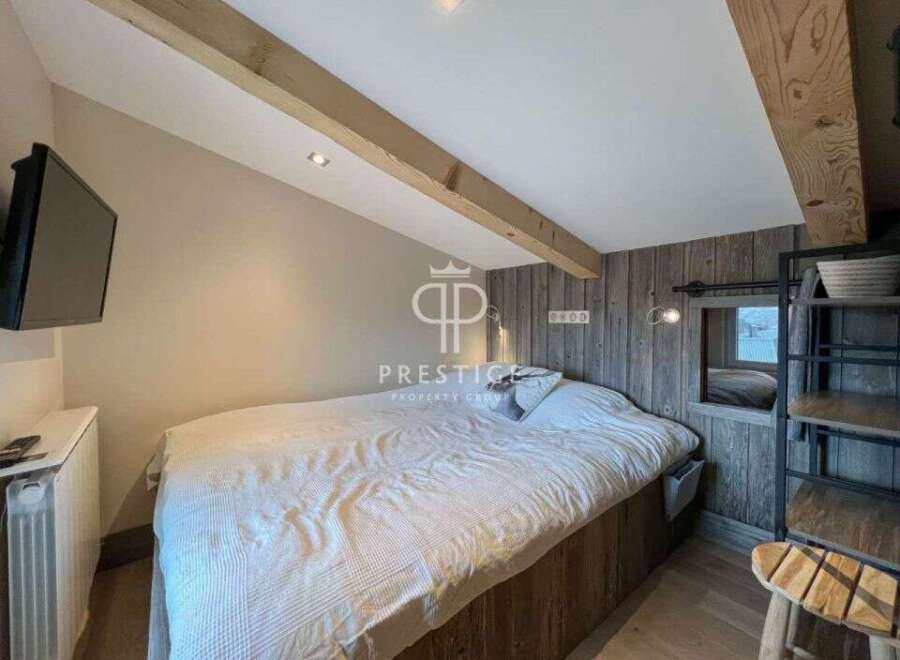 Discover a cozy bedroom retreat with rustic charm.
