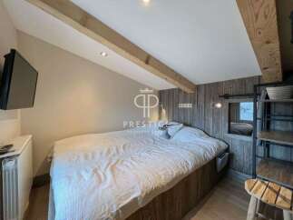 Discover a cozy bedroom retreat with rustic charm.