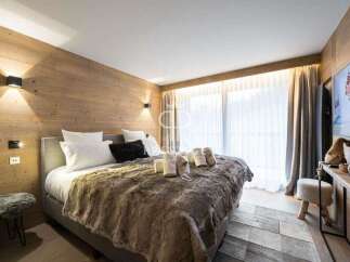 Experience ultimate comfort in this luxurious bedroom.