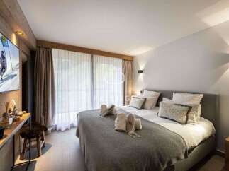 Experience luxury in this stunning bedroom.