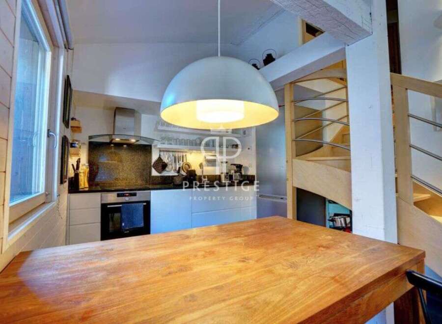Discover this charming property featuring a modern kitchen with sleek appliances and ample counter space.