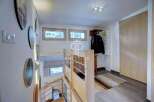 Discover a charming property with a unique staircase design.