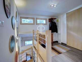 Discover a charming property with a unique staircase design.
